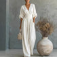 Női V-nyakú, magas derekú, széles szárú jumpsuit